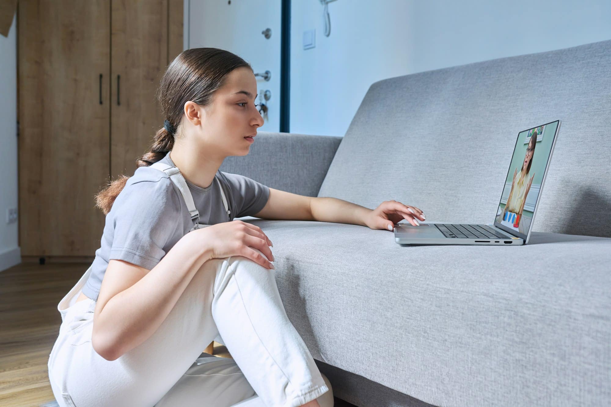 Young female on online therapy session with psychologist